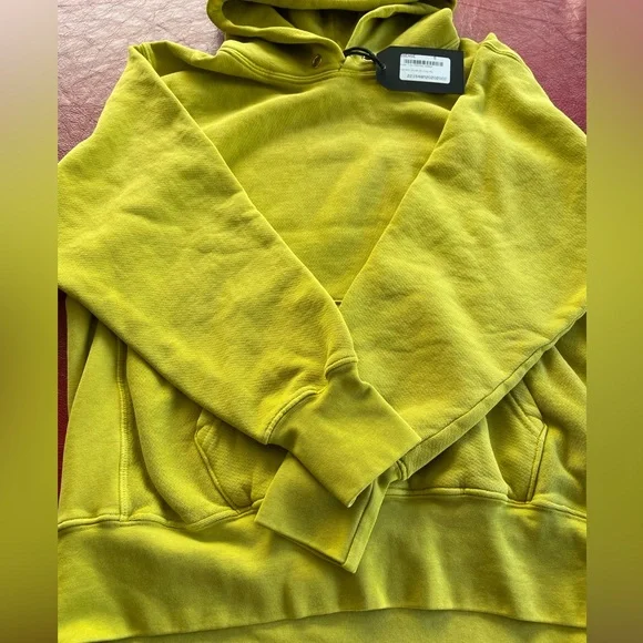 Unisex hoodie by Les Tien.